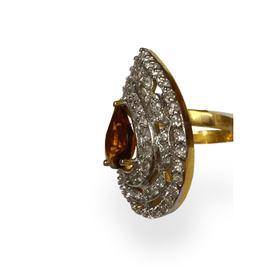 Anello a goccia in zirconi e topazio