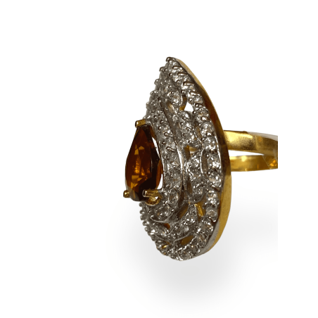 Anello a goccia in zirconi e topazio