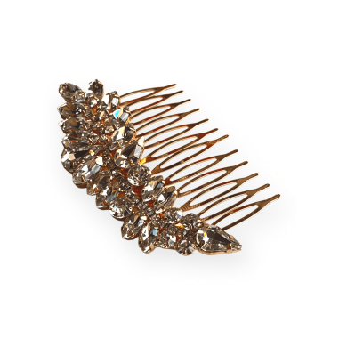 Pettinessa dorata con pietre bianche