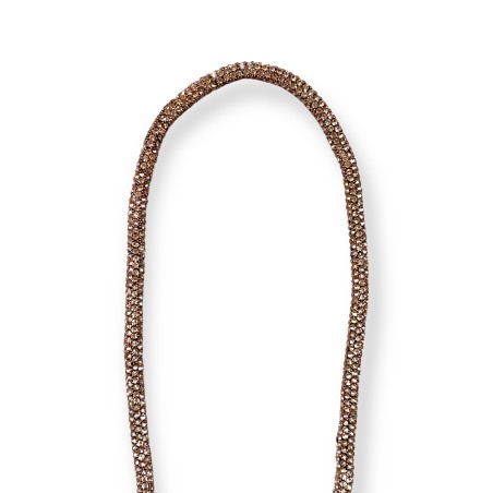 Collana lunga con piuma oro rosa